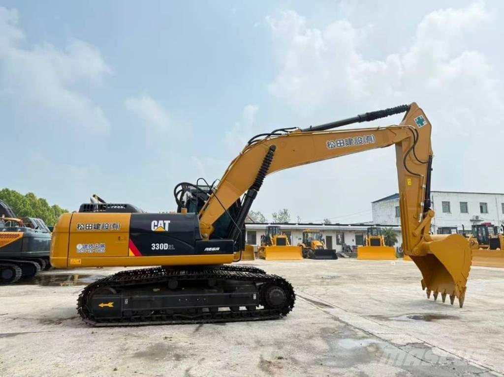 CAT 330 Гусеничні екскаватори