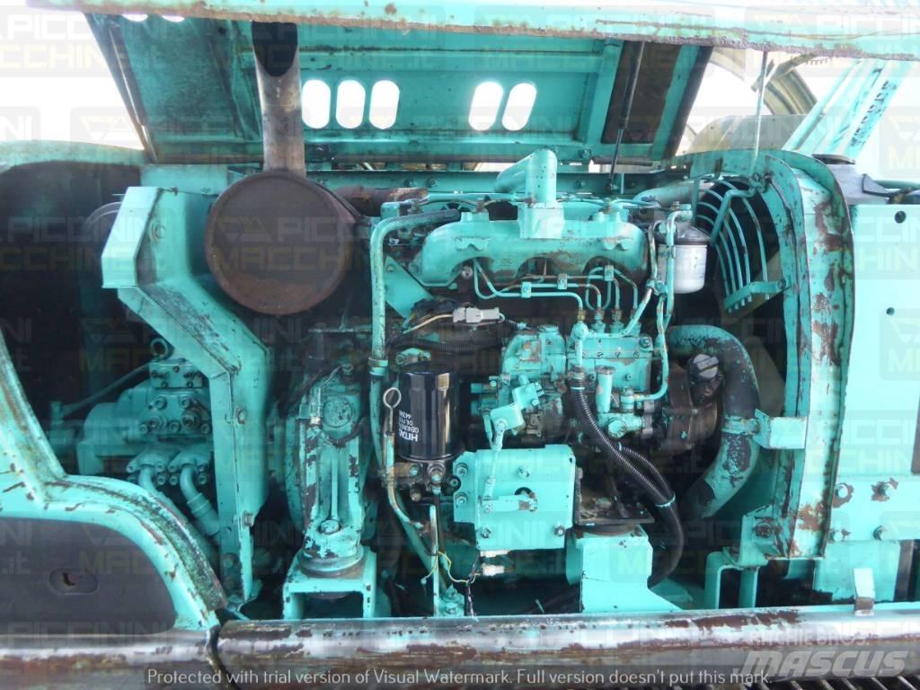 Kobelco Sk100 Середні екскаватори 7т. - 12т.