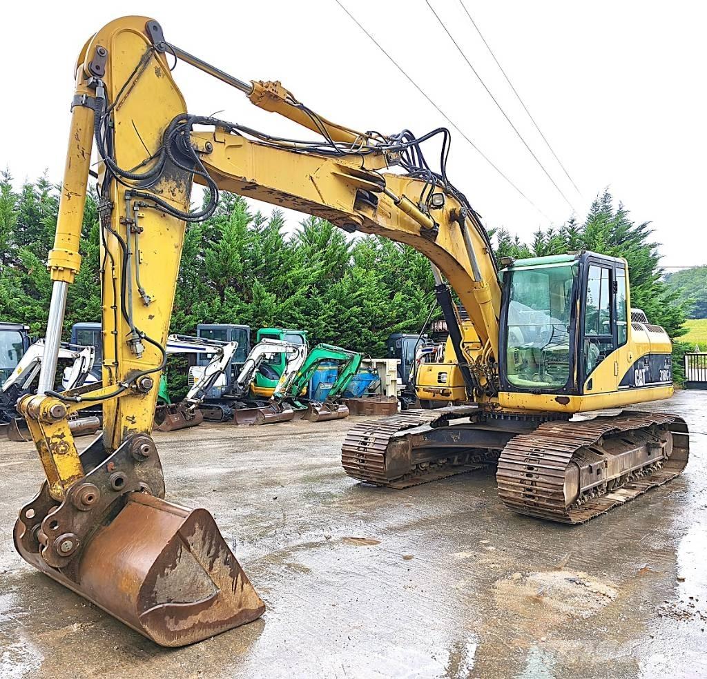 CAT 318 C Гусеничні екскаватори