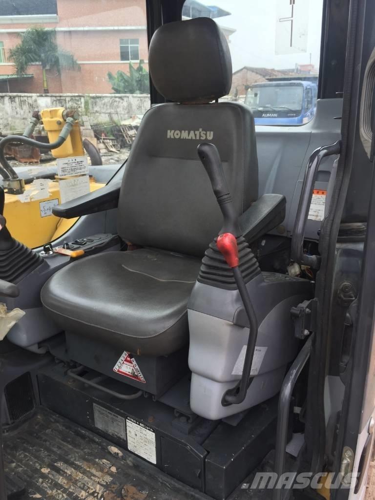 Komatsu pc78us Середні екскаватори 7т. - 12т.
