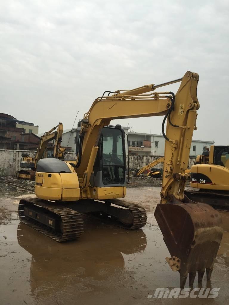 Komatsu pc78us Середні екскаватори 7т. - 12т.