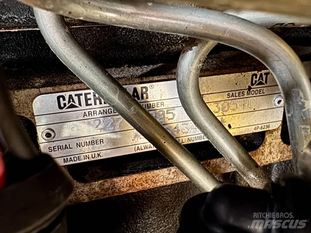 CAT 432 E Екскаватори-навантажувачі