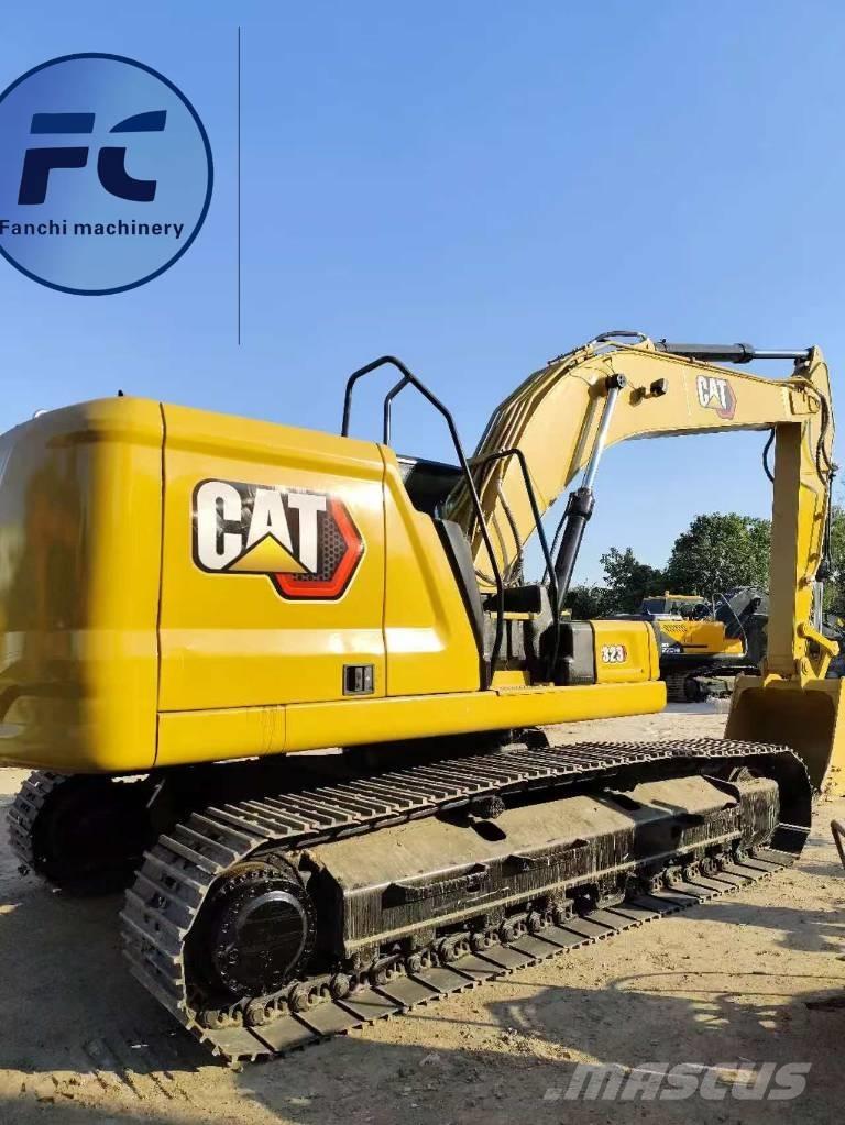 CAT 323 Гусеничні екскаватори