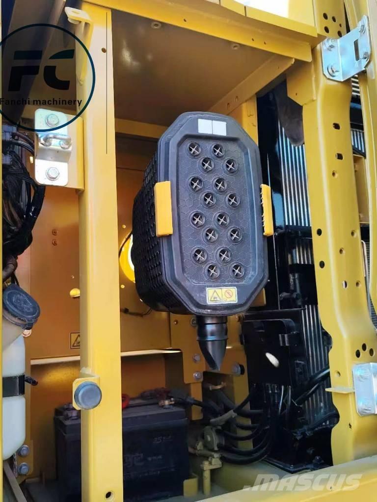 CAT 323 Гусеничні екскаватори