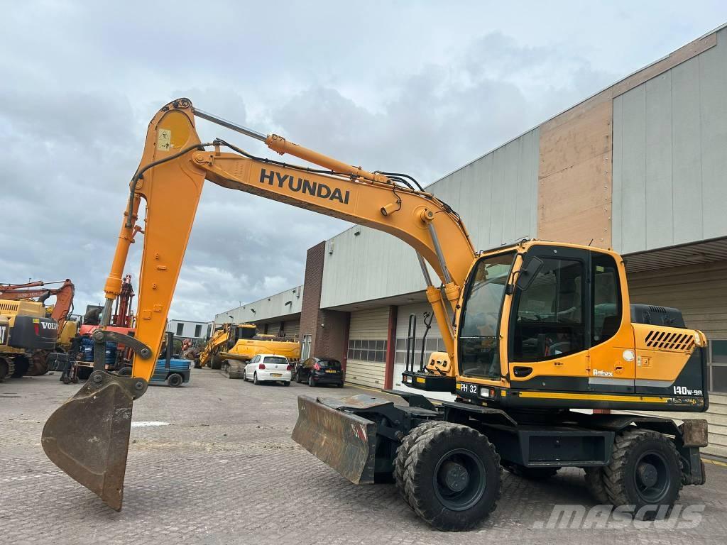 Hyundai 140W-9A Колісні екскаватори