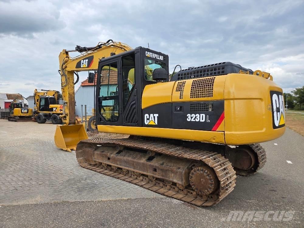 CAT 323DL Гусеничні екскаватори