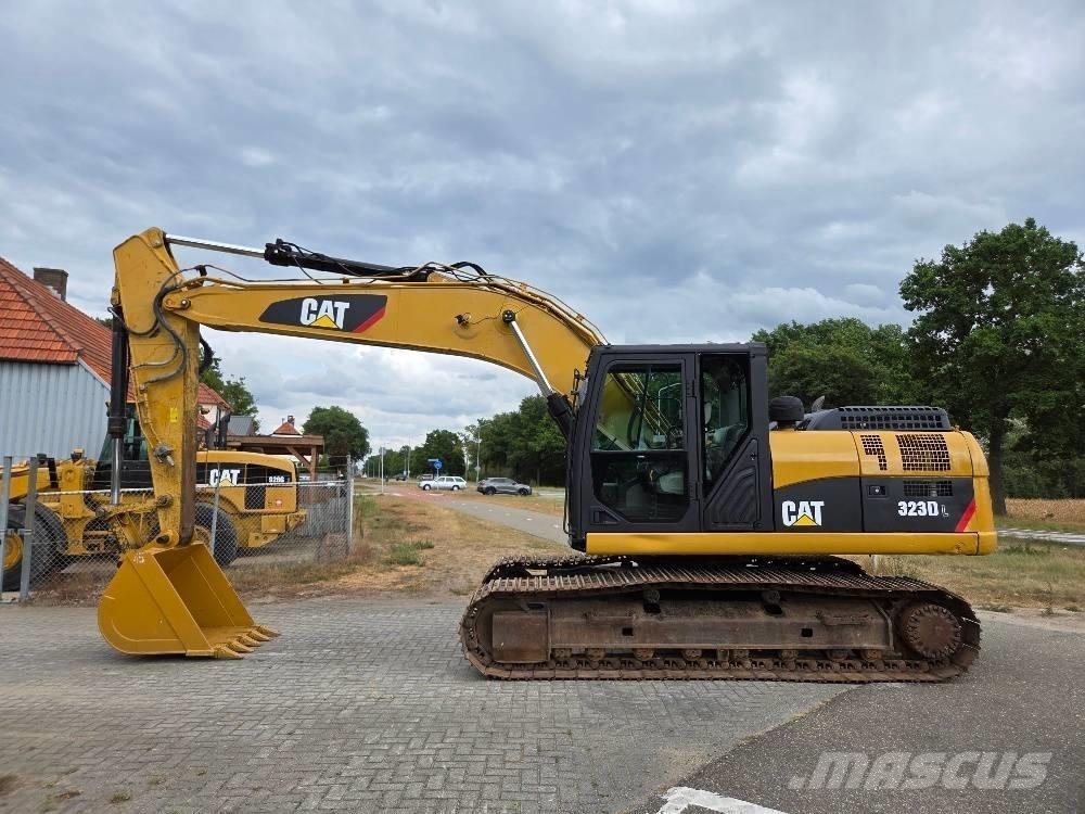 CAT 323DL Гусеничні екскаватори