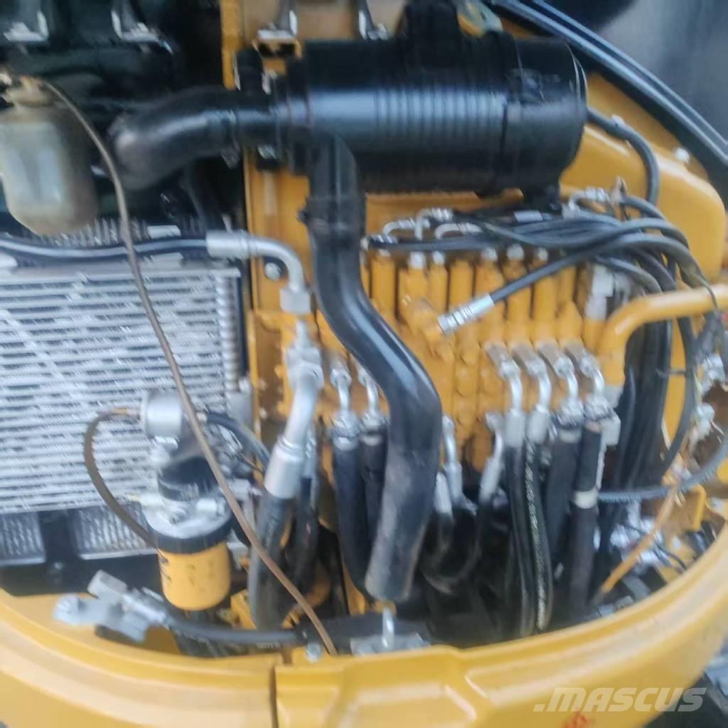 CAT 303 E Гусеничні екскаватори