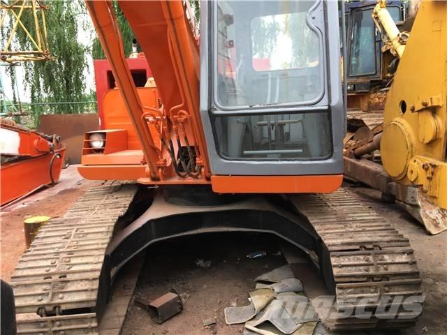 Hitachi EX100 Гусеничні екскаватори