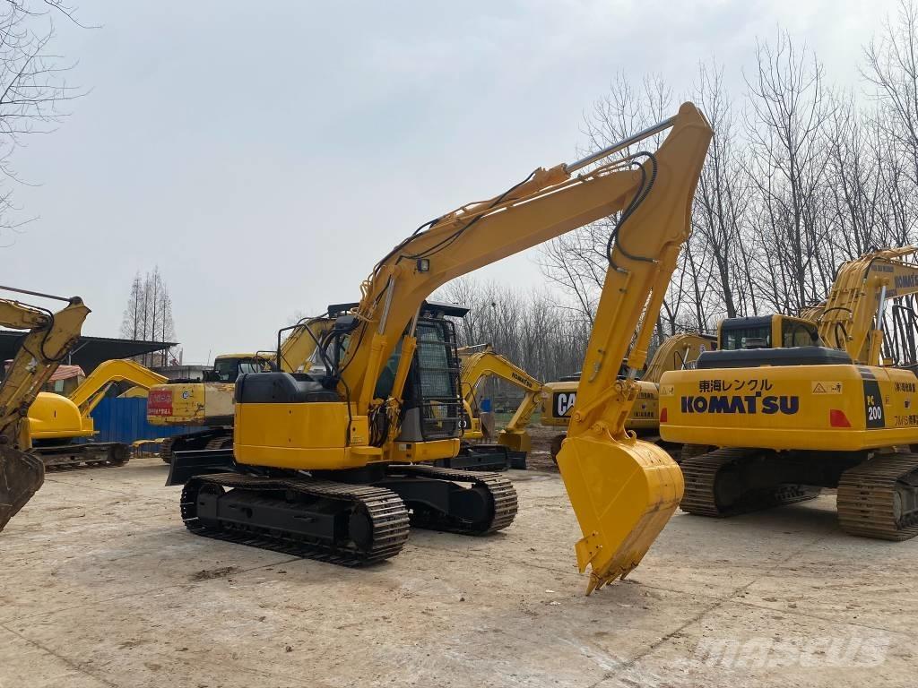 Komatsu PC128US Гусеничні екскаватори