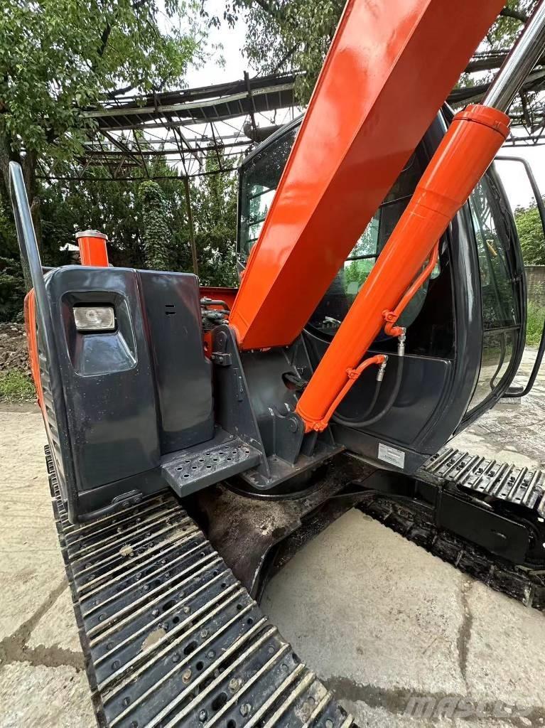 Hitachi 70 Гусеничні екскаватори