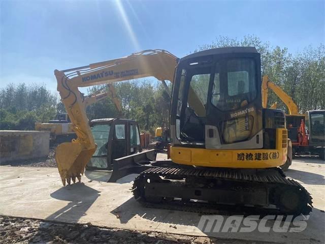 Komatsu pc78us Гусеничні екскаватори