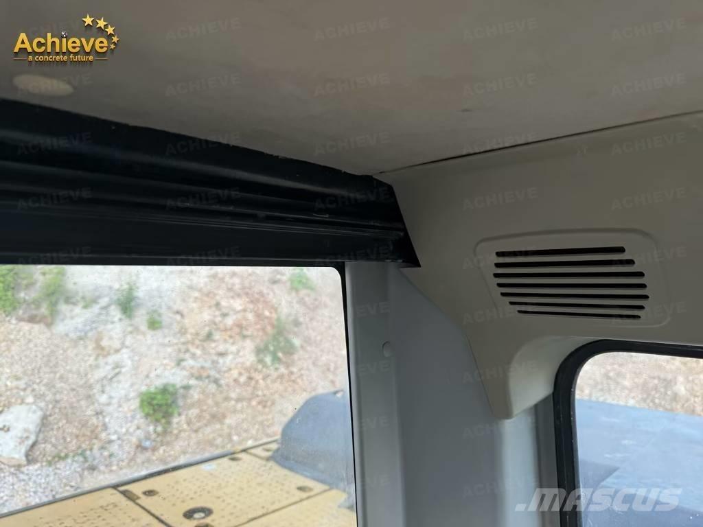 CAT 318DL Гусеничні екскаватори