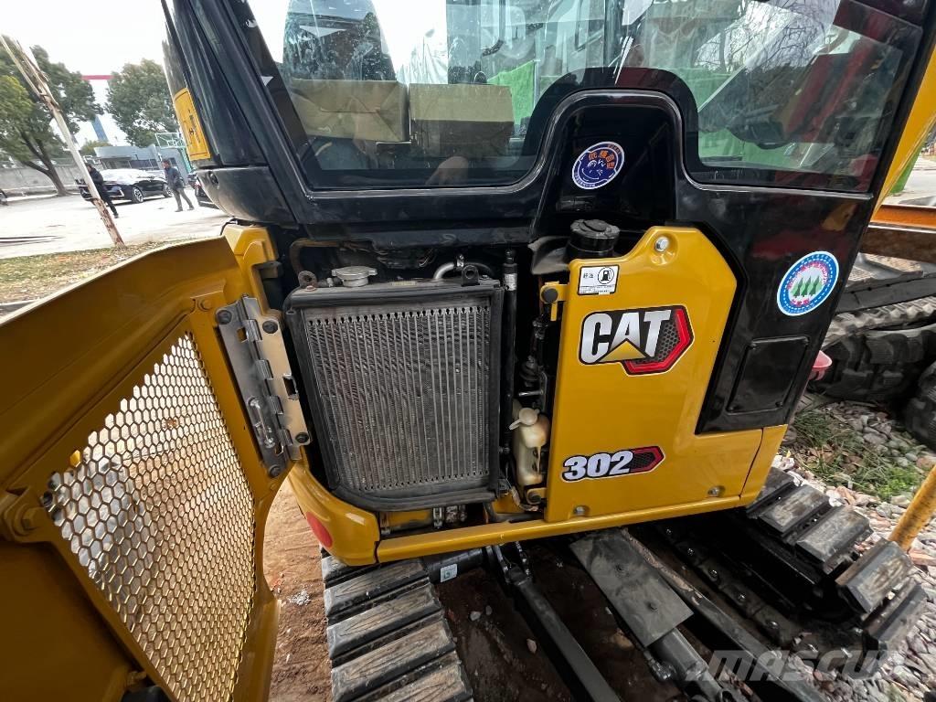 CAT 302 Гусеничні екскаватори