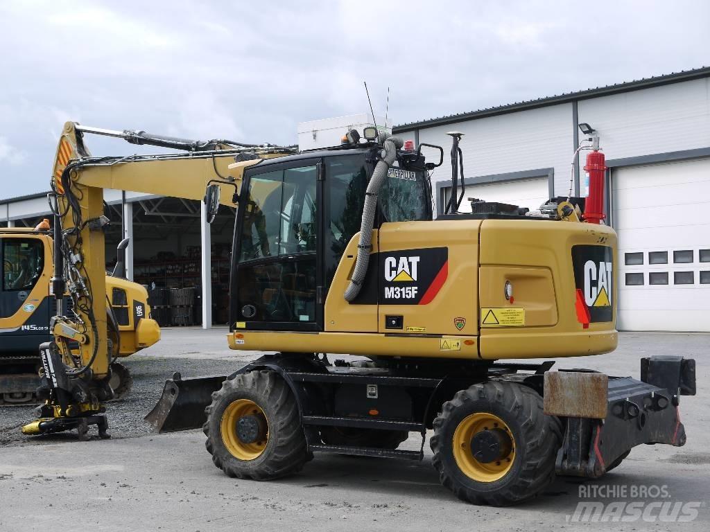 CAT M 315 F Колісні екскаватори