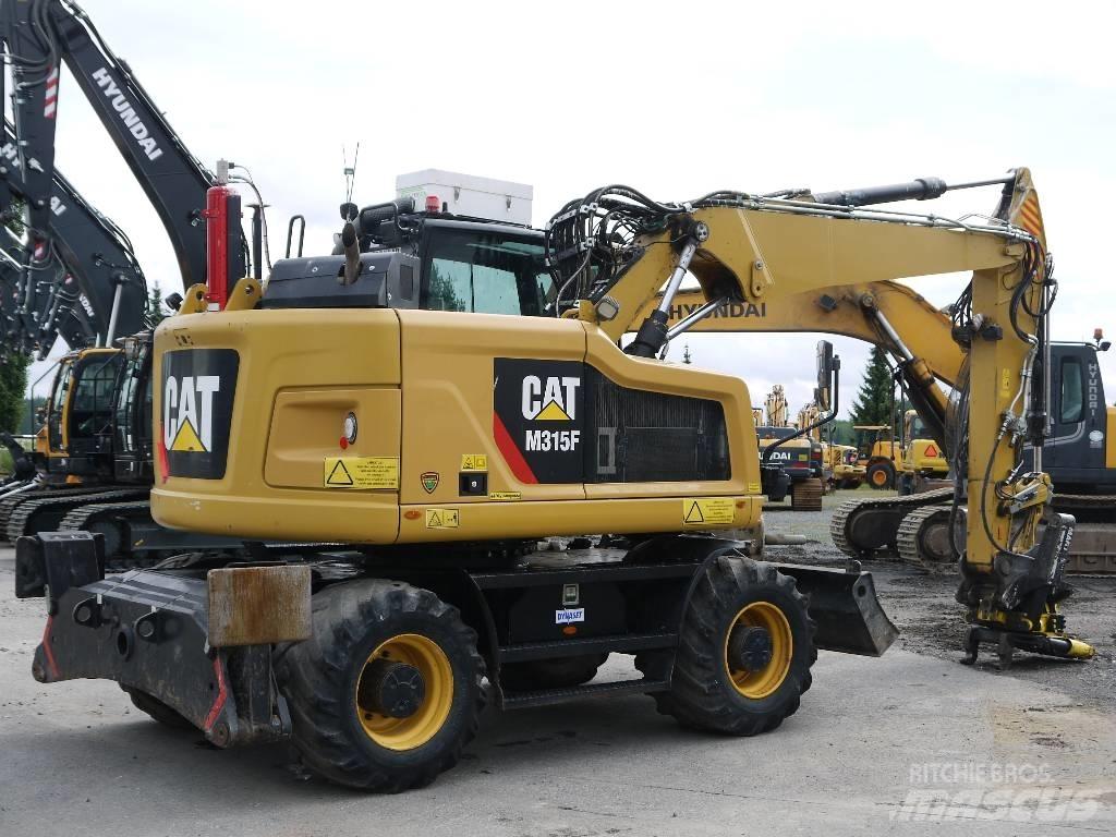 CAT M 315 F Колісні екскаватори