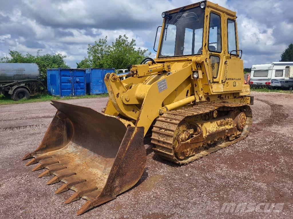 CAT 943 Гусеничні вантажники