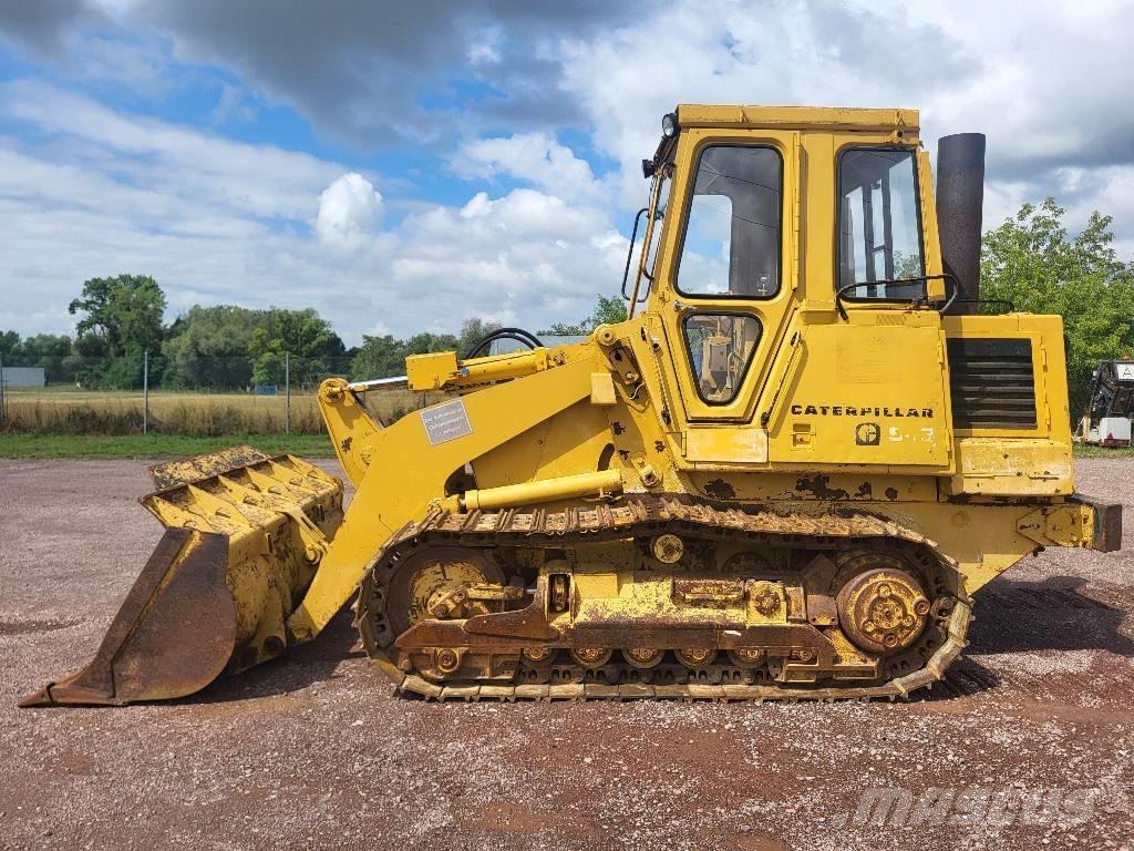 CAT 943 Гусеничні вантажники