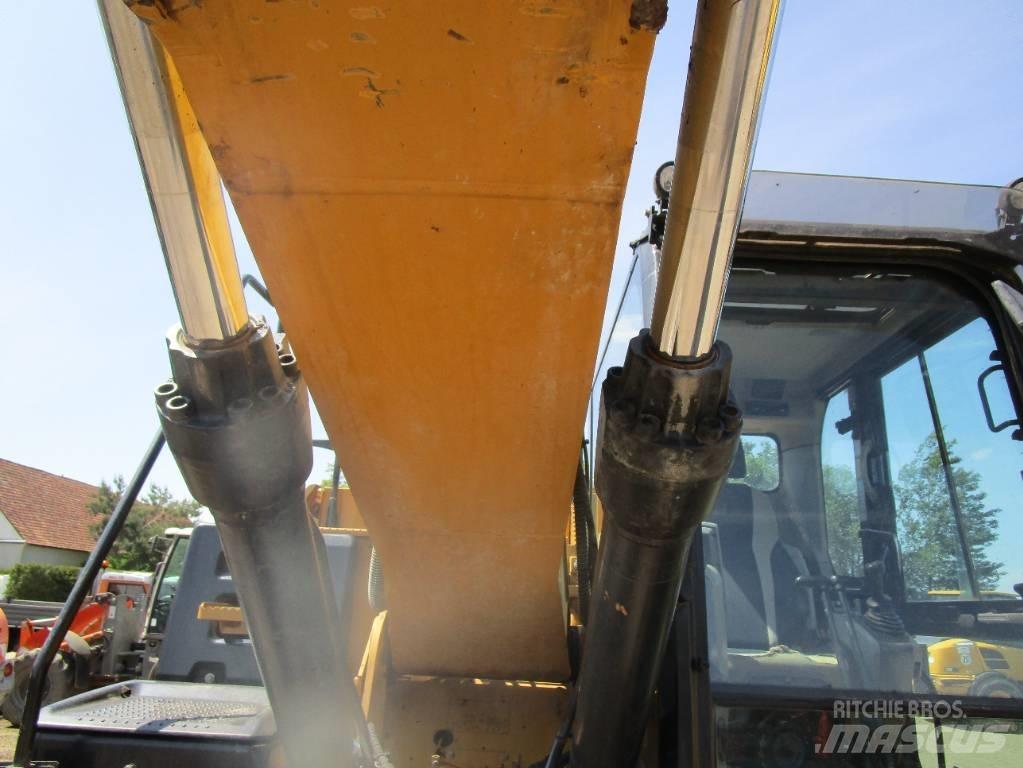 CAT 318 E L Гусеничні екскаватори