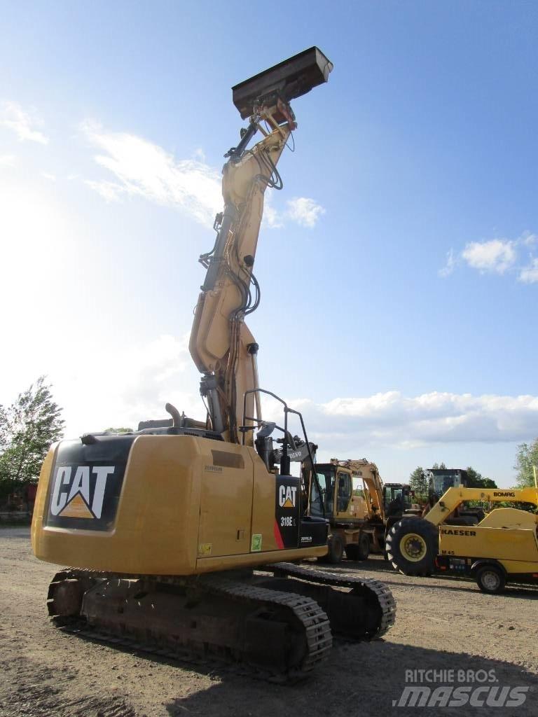 CAT 318 E L Гусеничні екскаватори