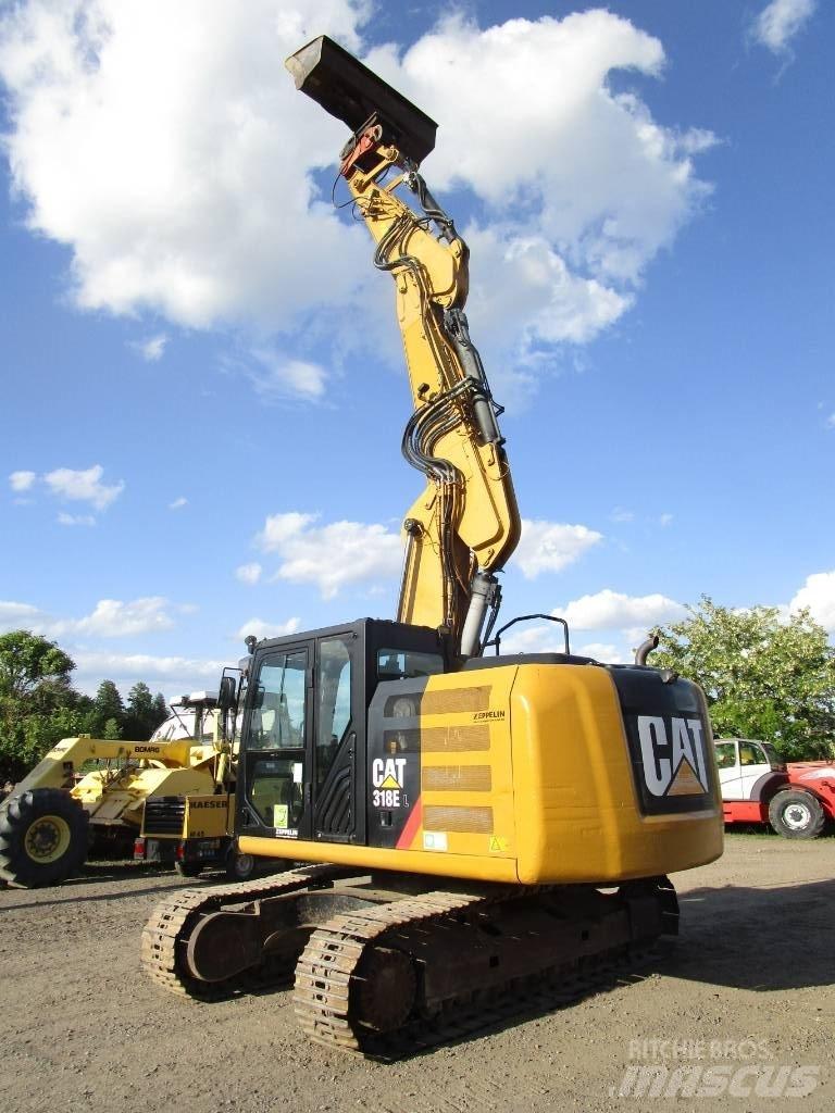 CAT 318 E L Гусеничні екскаватори
