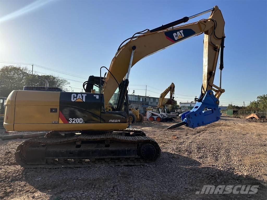 CAT 320 DL Гусеничні екскаватори