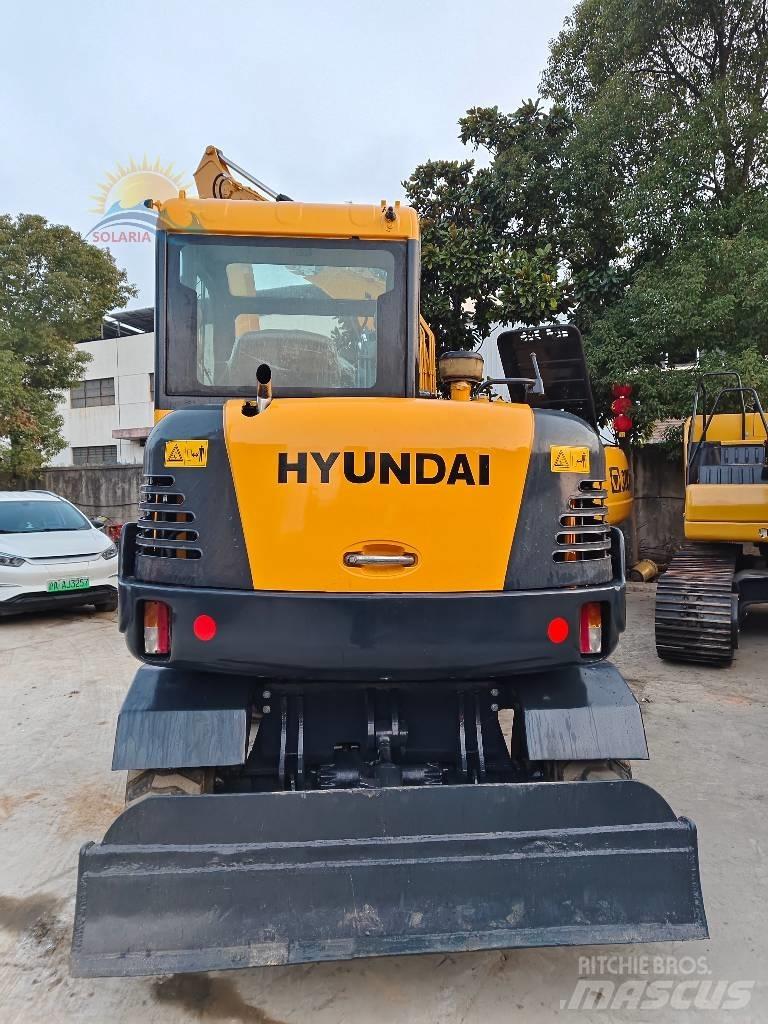 Hyundai R 60 W Колісні екскаватори