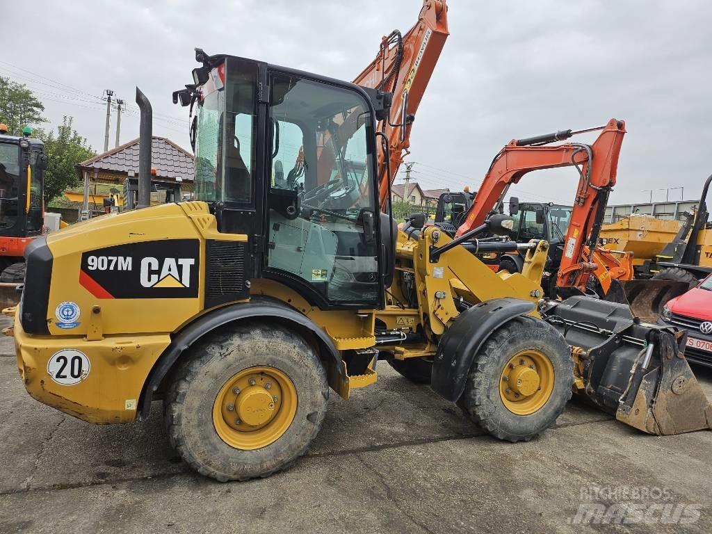 CAT 907M Фронтальні навантажувачі