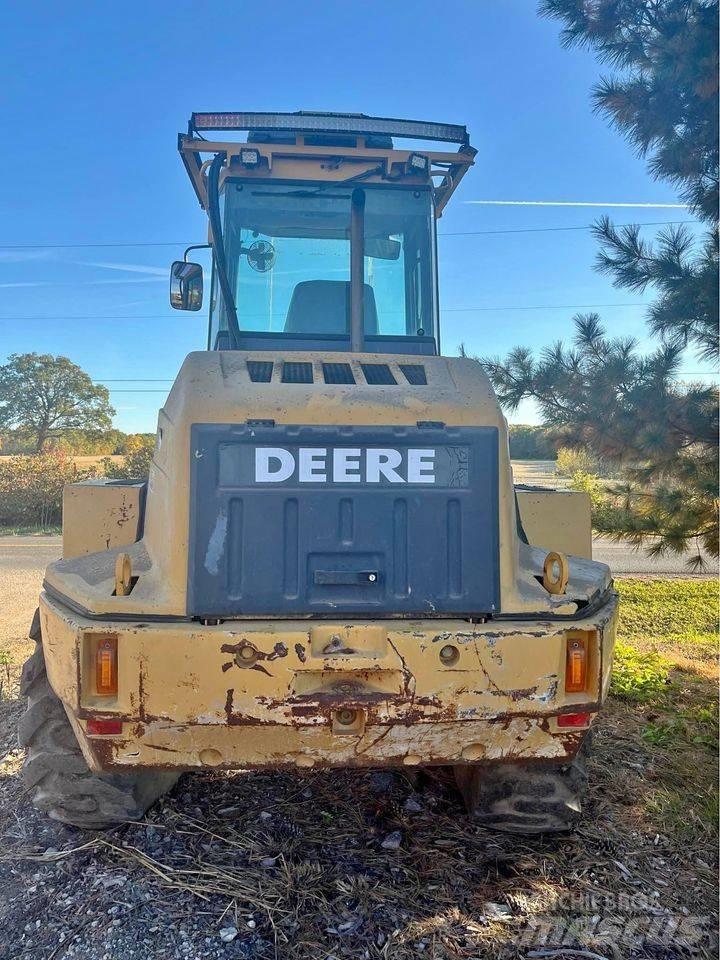 John Deere 324H Фронтальні навантажувачі
