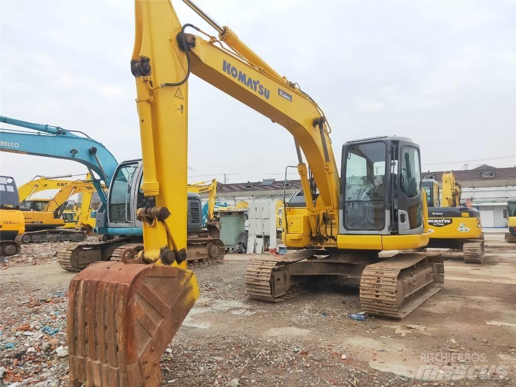 Komatsu PC 128 US Середні екскаватори 7т. - 12т.