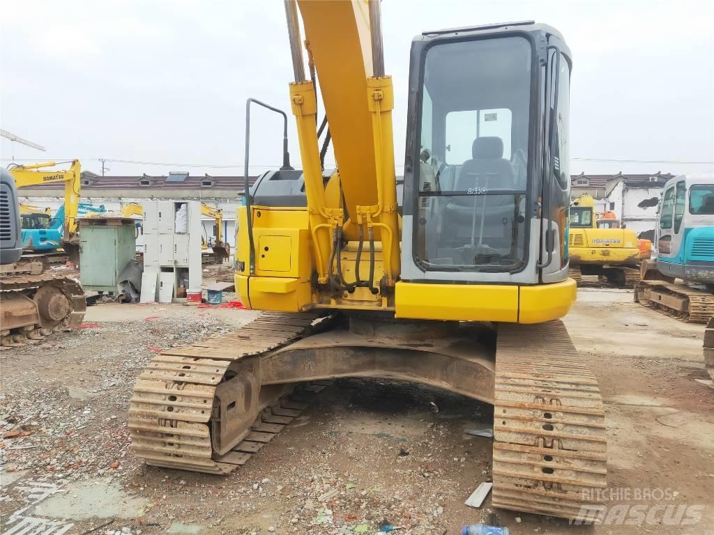 Komatsu PC 128 US Середні екскаватори 7т. - 12т.