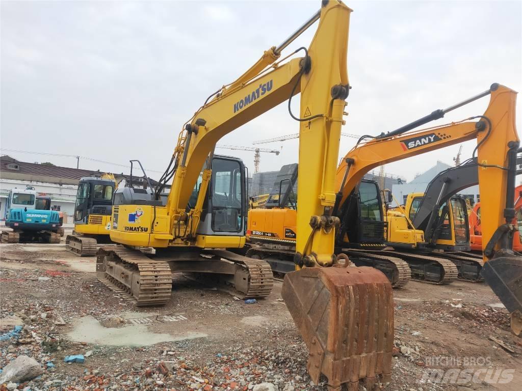 Komatsu PC 128 US Середні екскаватори 7т. - 12т.