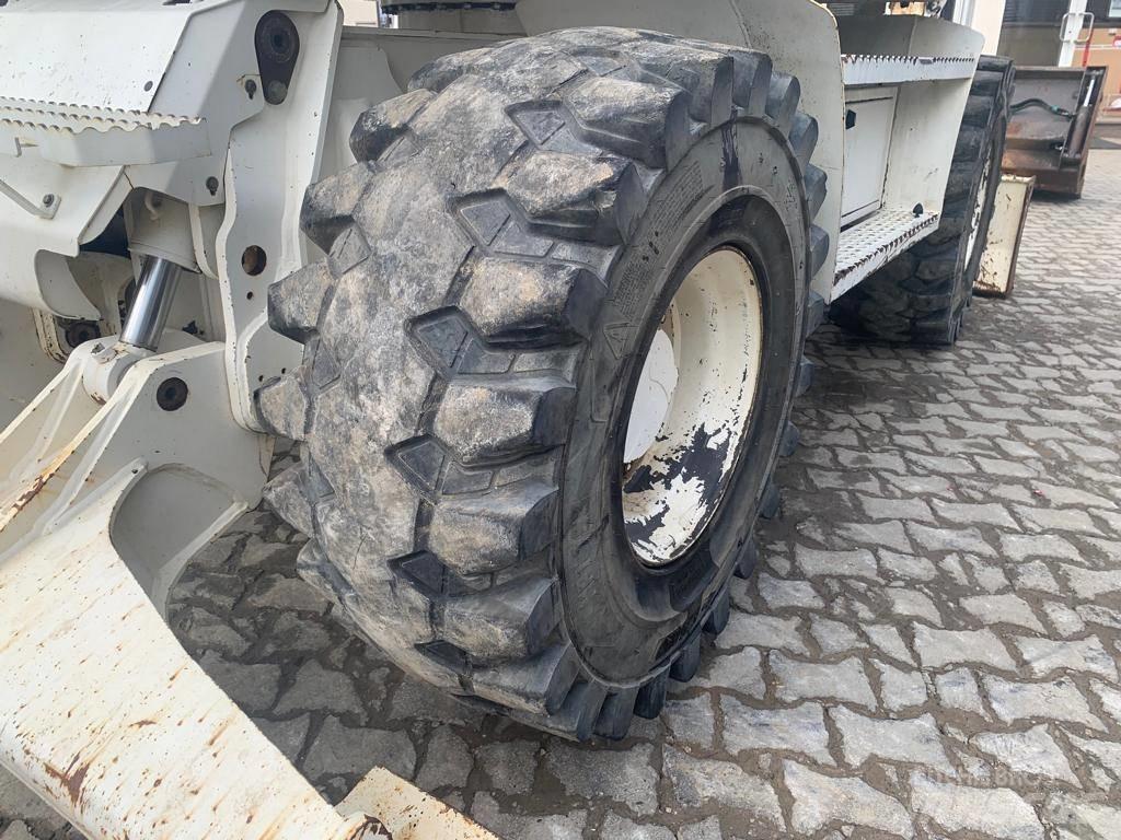 Mecalac 714 MW Колісні екскаватори