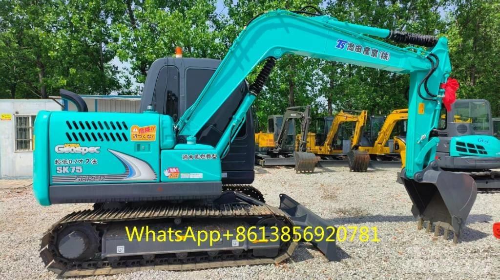 Komatsu SK75 Міні-екскаватори < 7т