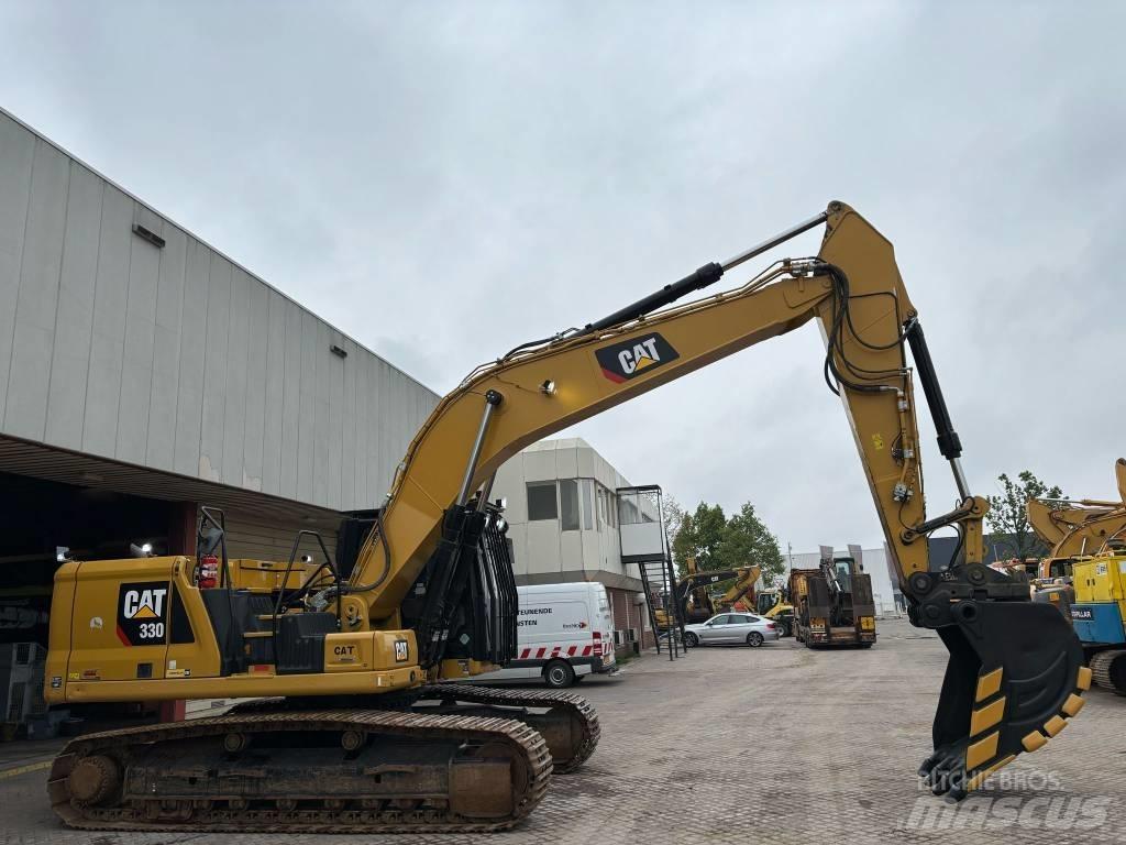 CAT 330 Гусеничні екскаватори