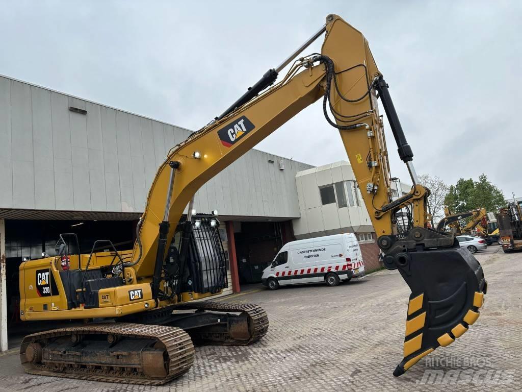 CAT 330 Гусеничні екскаватори