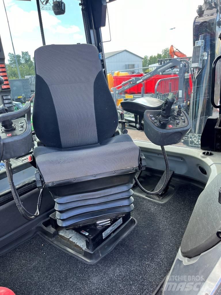 Huddig 1260C City Екскаватори-навантажувачі