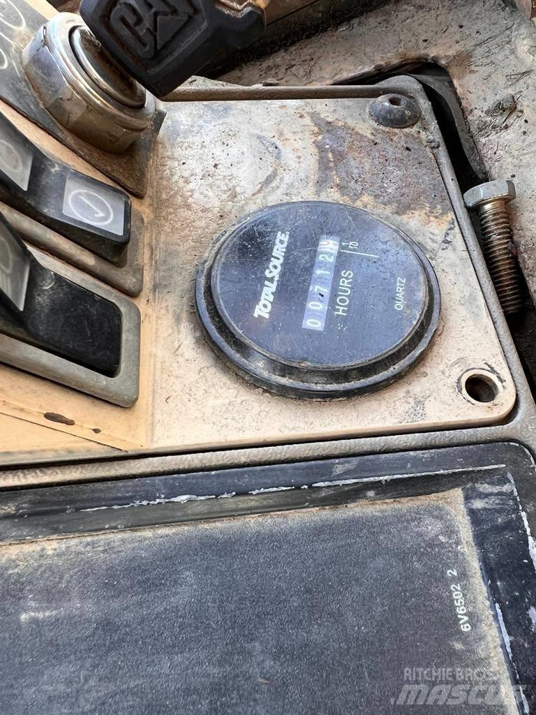 CAT 973 LGP Гусеничні вантажники