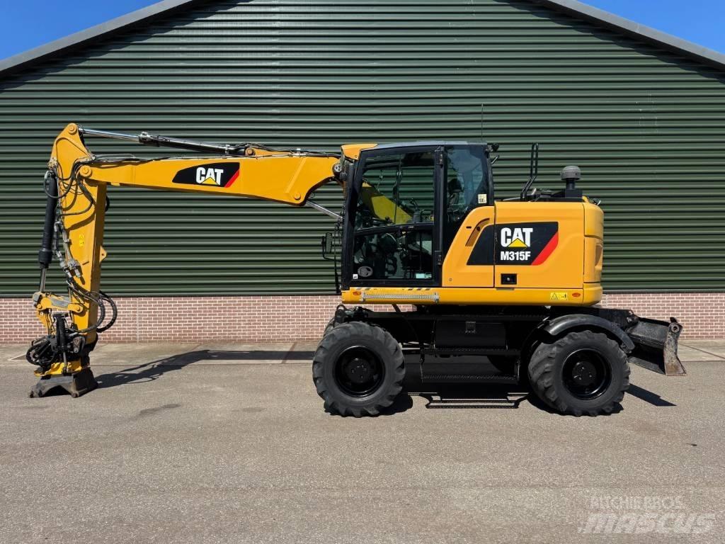 CAT M 315 F Колісні екскаватори