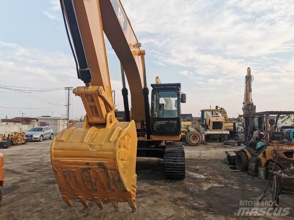 CAT 330DL Гусеничні екскаватори