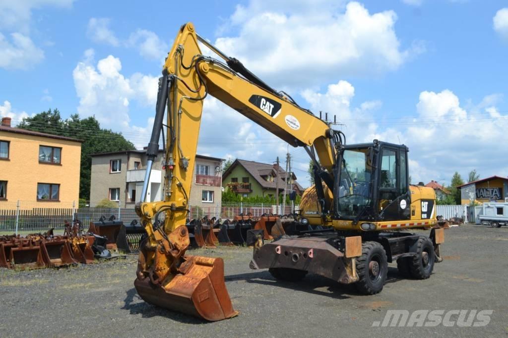 CAT M 315 D Колісні екскаватори