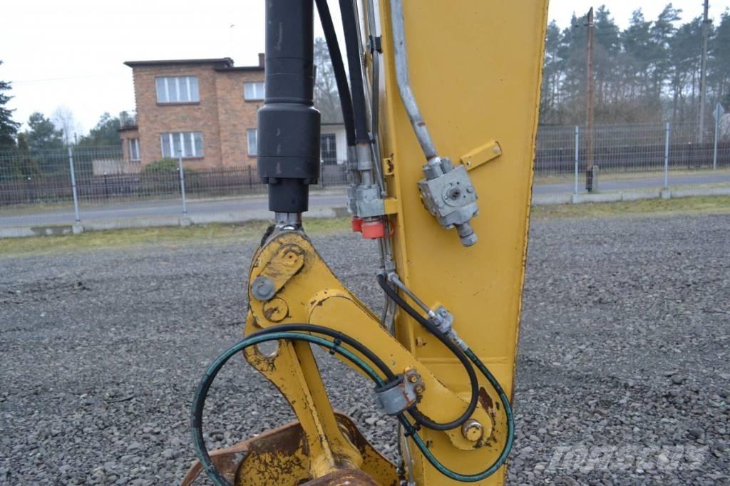 CAT M 315 D Колісні екскаватори