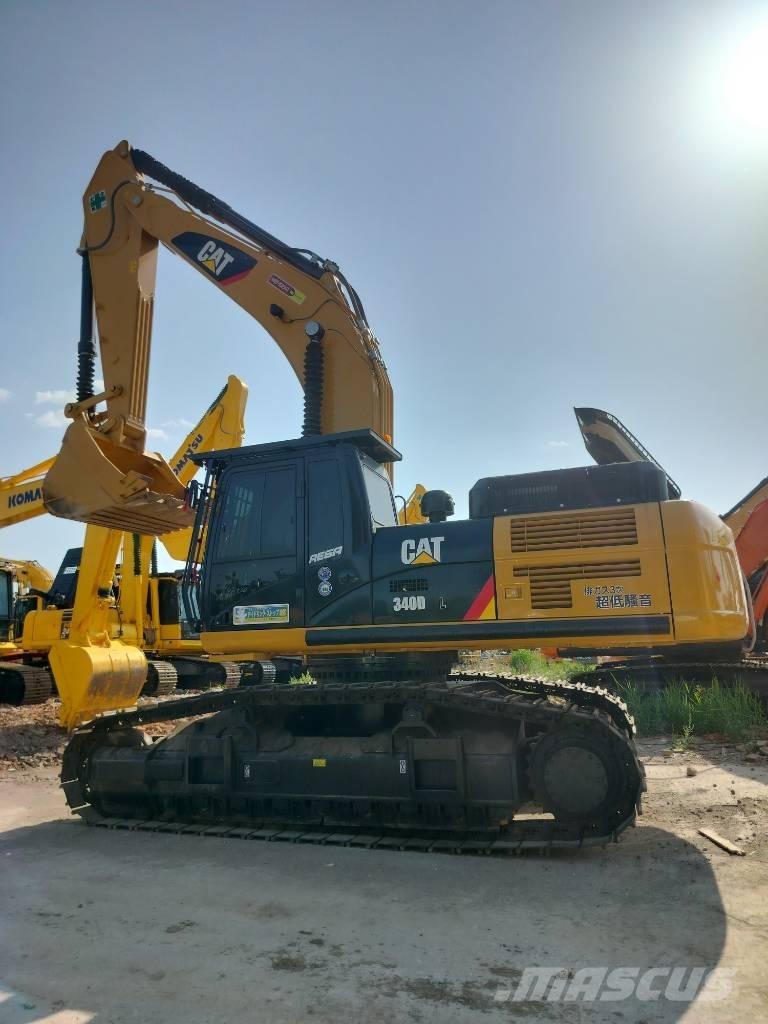 CAT 340 Гусеничні екскаватори