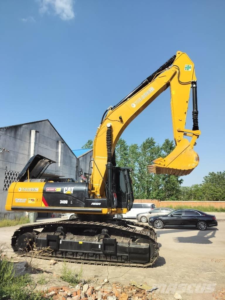 CAT 340 Гусеничні екскаватори