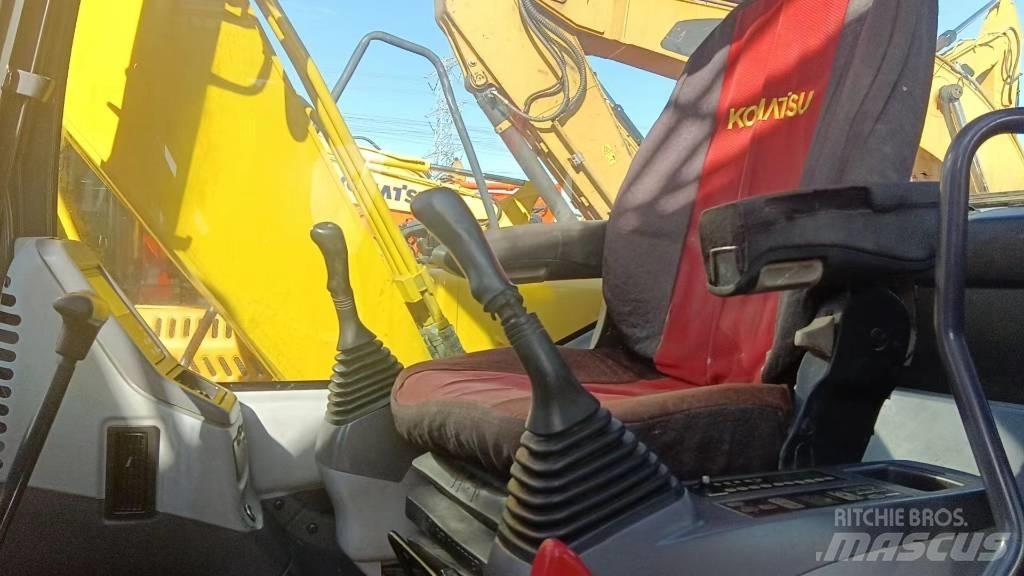 Komatsu PC130 Гусеничні екскаватори