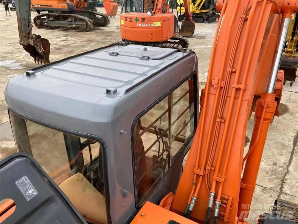 Hitachi EX 1200 Гусеничні екскаватори