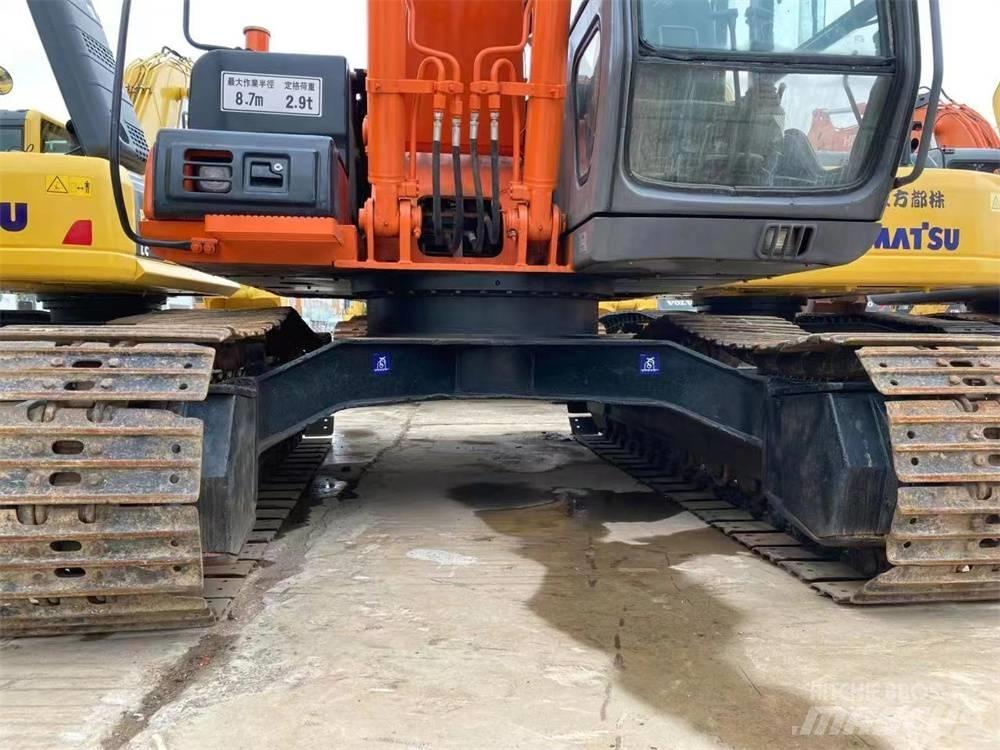 Hitachi EX 1200 Гусеничні екскаватори