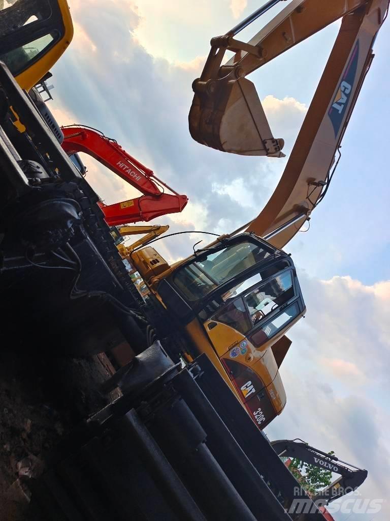 CAT 320 C Екскаватори-амфібії