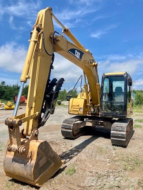 CAT 311 C Гусеничні екскаватори