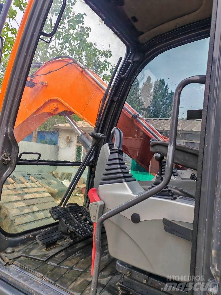 Doosan DX75 Середні екскаватори 7т. - 12т.